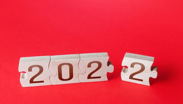 Puzzle e 2022 L'inizio di un nuovo anno apre nuove opportunità e orizzonti Tendenze e idee Vacanze e Natale Pianificazione finanziaria aziendale Implementazione del budget Previsioni