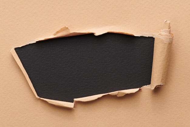Quadro di carta strappata con bordi strappati Finestra per testo con spazio per la copia colori beige neri frammenti di pagine di quaderno sfondo astratto