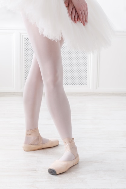 Quarta posizione delle gambe della ballerina