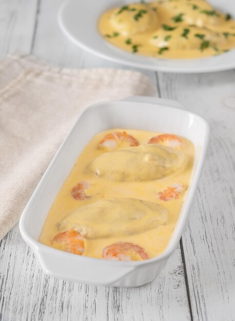 Quenelle vellutata di pesce con salsa olandese