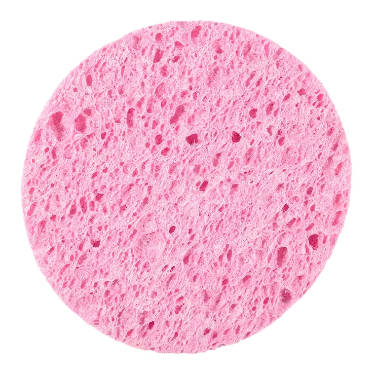 Foto rafia rosa per il lavaggio su sfondo bianco