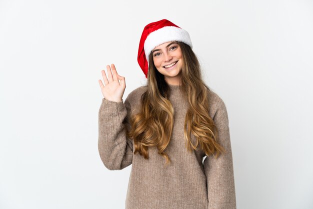 ragazza con cappello di Natale isolato su sfondo bianco