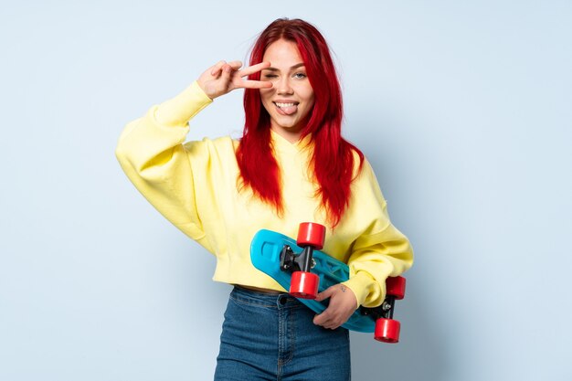 Ragazza dei capelli rossi dell'adolescente