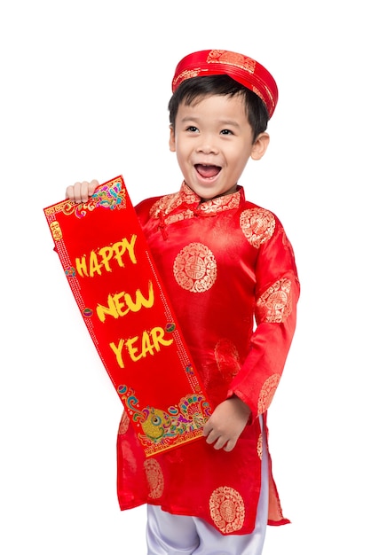 Ragazzo vietnamita che si congratula con il suo nuovo anno. Felice nuovo anno Lunare.