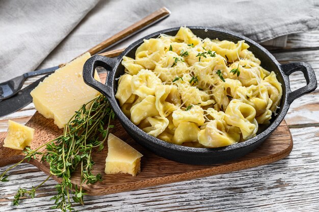 Ravioli al parmigiano in padella