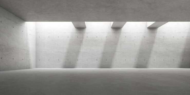 Rendering 3D della stanza di cemento vuota con ombra sul muro.