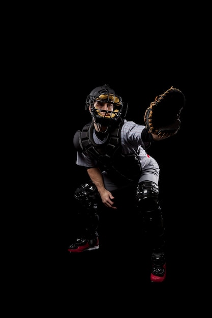 Ricevitore di baseball con il suo casco di sicurezza