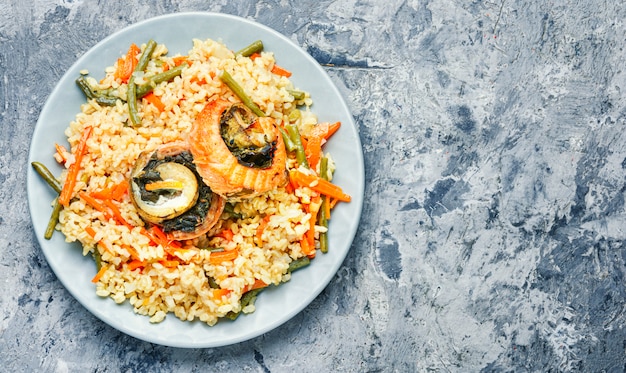 Riso con frutti di mare e verdure