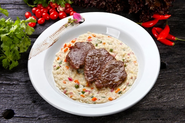 Risotto con carne arrosto