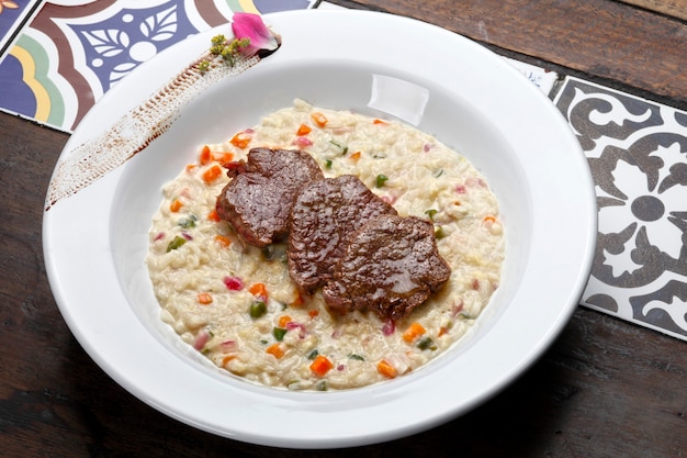 Risotto con carne arrosto