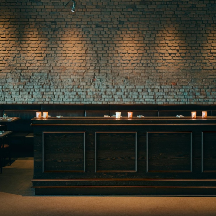 Foto ristorante spazio legno scuro contatore interno candela ristorante di notte sfondo bokhe