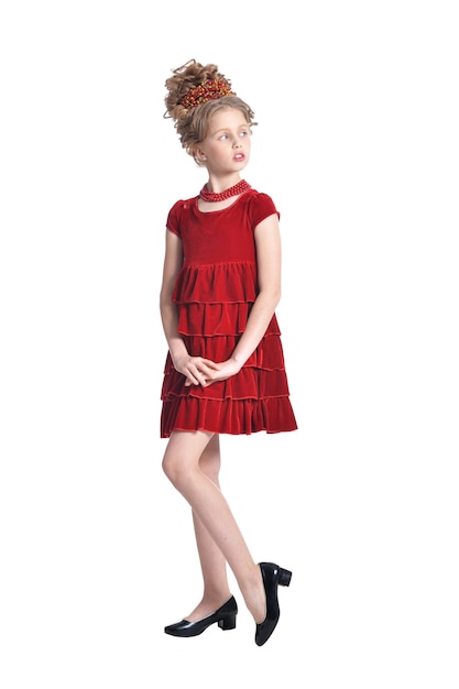 Ritratto integrale della ragazza nella posa rossa del vestito isolata