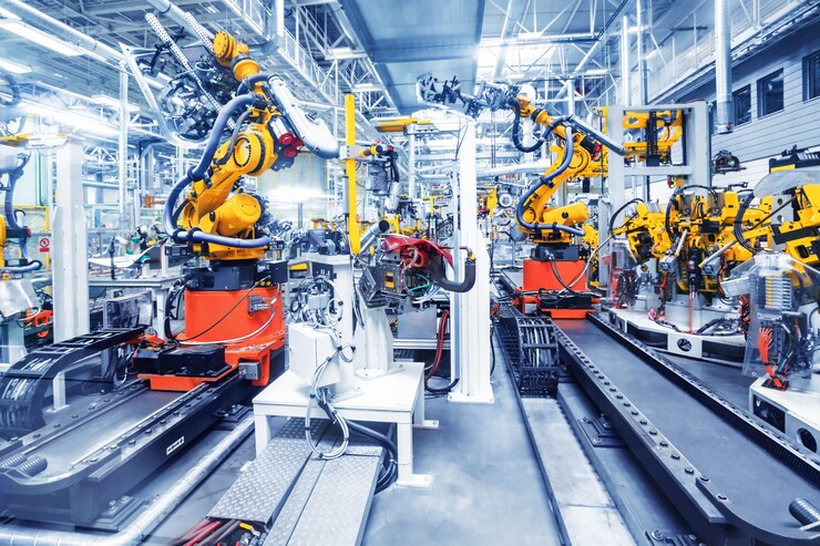 Robot in una fabbrica di automobili