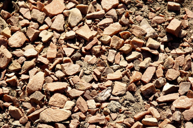 Roccia e pietra sabbia macinata primo piano texture sfondo vista dall'alto