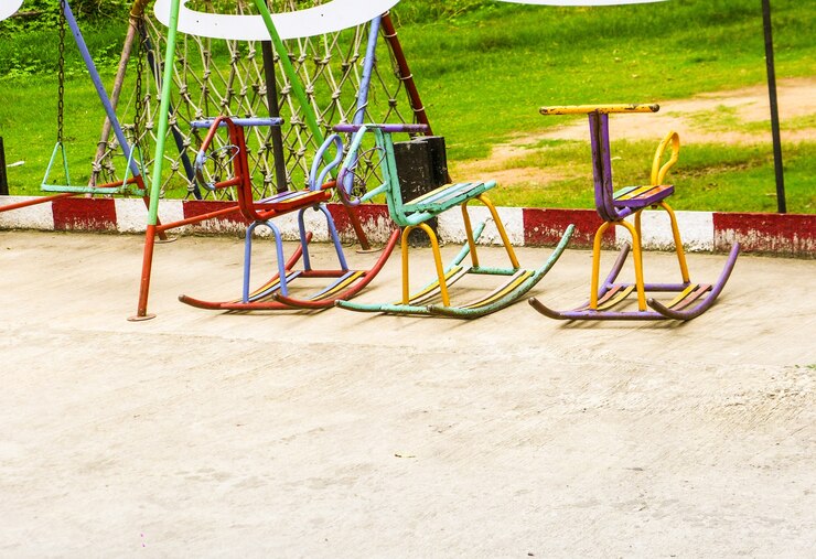 Photo rocking horse made of steel as a toy for children in playground