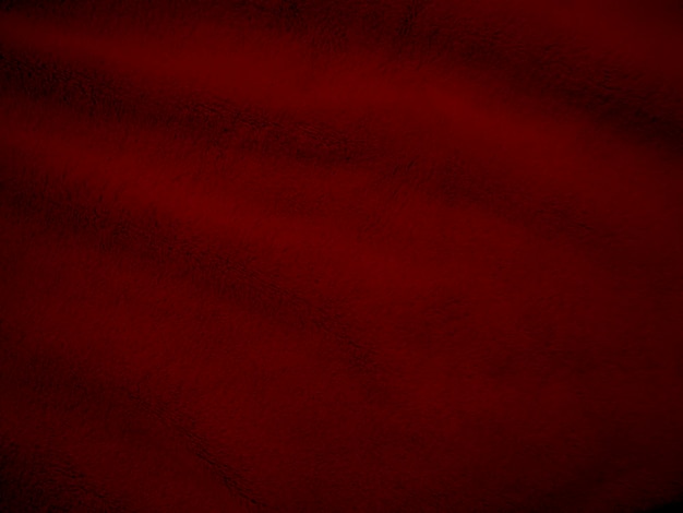 Rosso lana pulita texture di sfondo luce naturale lana di pecora Tessuto di cotone rosso senza soluzione di continuità di soffice pelliccia per i progettisti closeup frammento tappeto di lana bianca