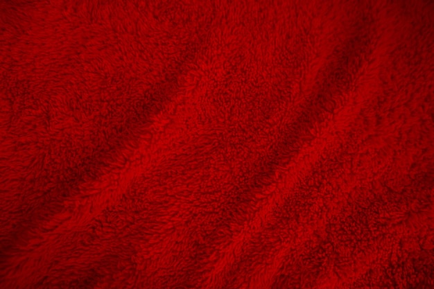 Rosso lana pulita texture sfondo luce naturale lana di pecora rosso cotone senza cuciture texture di soffice pelliccia per designer giorno di natale primo piano frammento lana rossa carpetx9