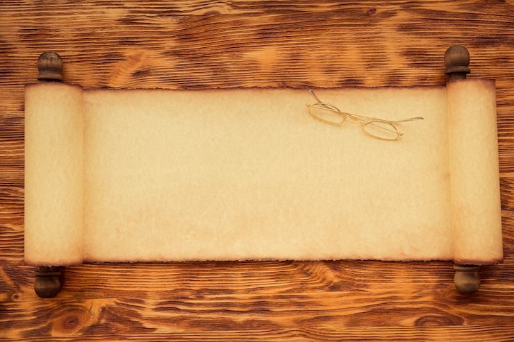Foto rotolo di carta di babbo natale su fondo di legno