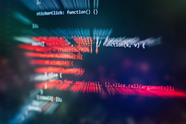 running computer data / www programming. coding script text on screen. notebook closeup photo.