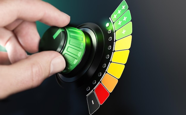 Ruotando a mano una manopola con scala di efficienza dal colore nero e rosso al colore verde. Immagine composita tra una fotografia a mano e uno sfondo 3D.