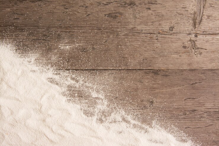 Sabbia bianca e su legno planked, sfondo estate con spazio di copia