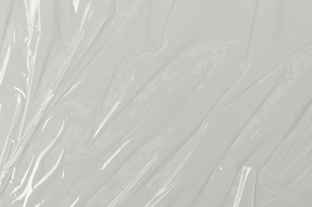 Sacchetto di cellofano di plastica trasparente su sfondo bianco sfondo tessuto di pellicola di plastica bianca tessuto di sacchetto di plastica bianco
