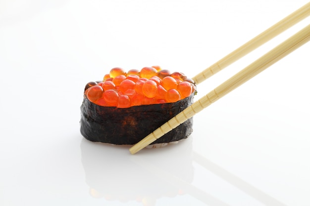 Salmon egg on sushi nigiri roll