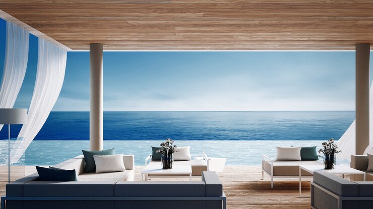 Salone della spiaggia vivente - villa dell'oceano sulla vista del mare per la vacanza e l'estate / 3d rendono l'interno