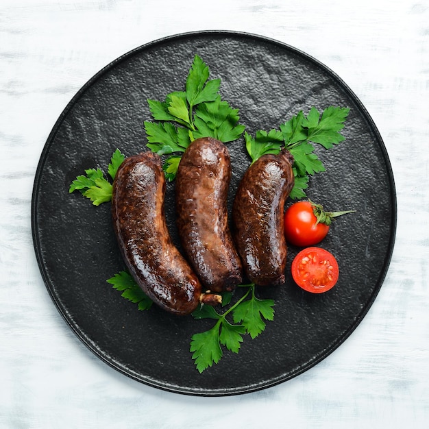 Salsiccia di sangue al forno Salsiccia di grano saraceno Vista dall'alto Spazio libero per il testo