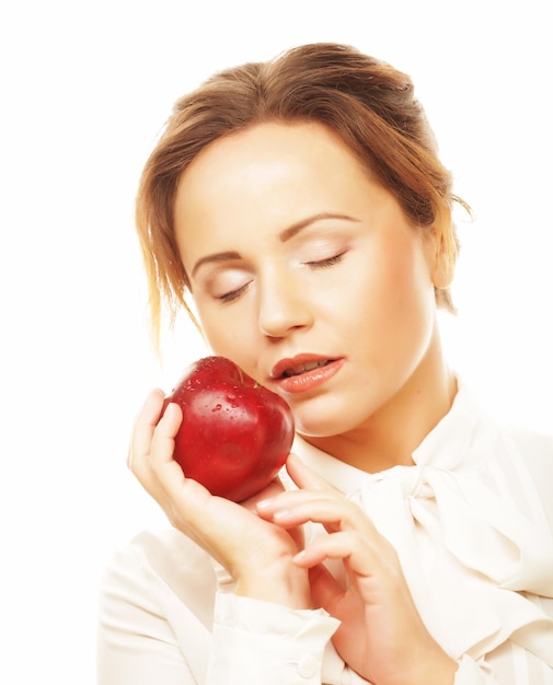 Salute dieta e concetto di persone giovane donna che tiene mela rossa