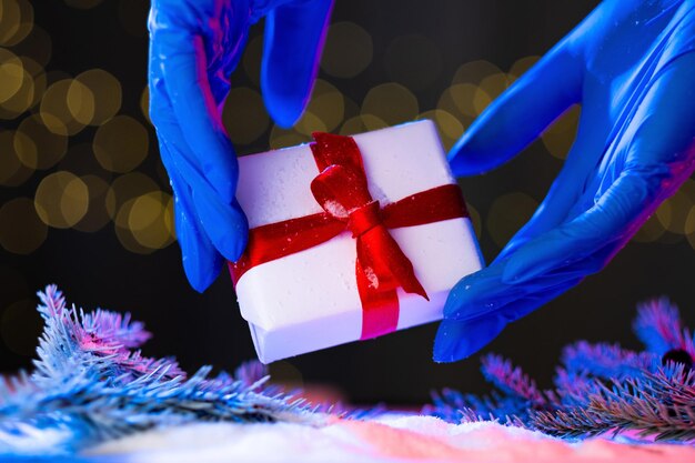 Saluto di protezione contro la pandemia del regalo di Natale