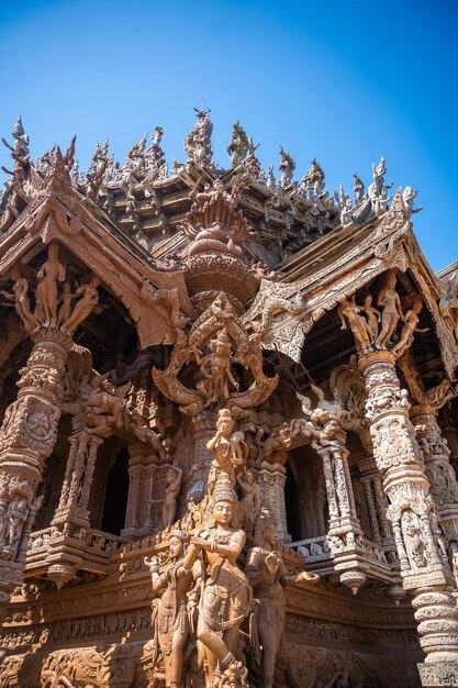 Sanctuary of truth wooden temple in pattaya thailand is a gigantic wood construction located at the