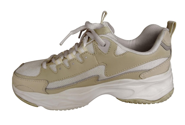 Scarpe da ginnastica beige isolate su bianco