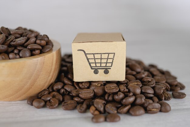 Scatola con il simbolo del logo del carrello della spesa sui chicchi di caffè, Import Export Shopping online o servizio di consegna eCommerce negozio spedizione prodotto, commercio, concetto fornitore.