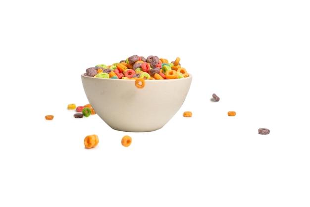 Scatola di cereali colorata per la colazione del mattino Fiocchi di mais che cadono nella ciotola bianca Motion Copyspace