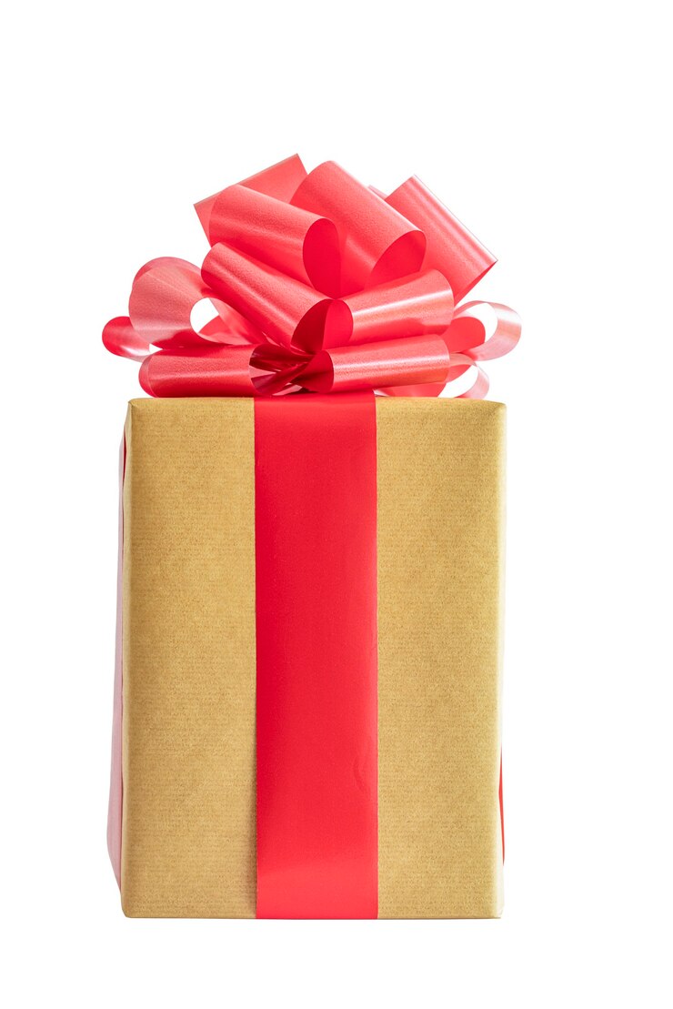 Foto scatola regalo di natale in carta artigianale con fiocco