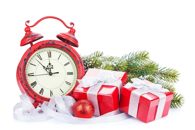 Scatole regalo orologio di Natale e abete della neve