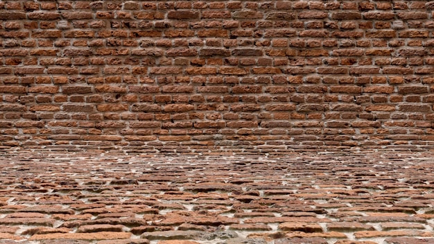 scena dello studio della vecchia struttura del fondo del muro di mattoni rossi, mattoni ruvidi e incrinati della parete.