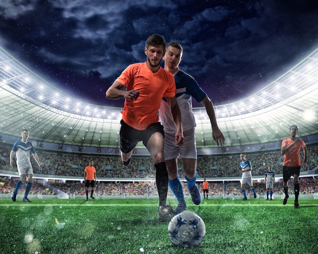 Scena di calcio con giocatori di calcio in competizione allo stadio
