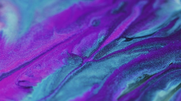 Scintillante consistenza fluida vernice spruzzo di inchiostro blu viola