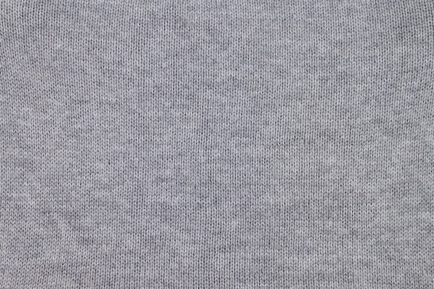 Seampless grigio maglieria tessuto texture di sfondo.