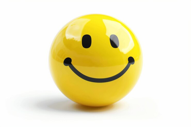 Photo sebuah wajah smiley kuning dengan wajah smiley di atasnya