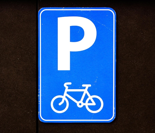 Segno di parcheggio per biciclette Segno di parcheggio blu per i ciclisti