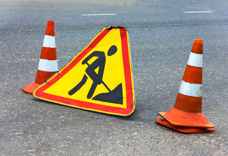 segno di riparazione della strada