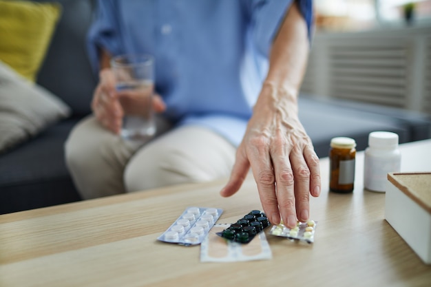 Senior Woman Taking Pills