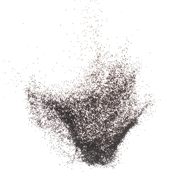 Sesamo nero che scende, grano di sesamo nero che galleggia, cade nell'aria.
