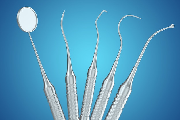 Set dentale, specchio, sonda, isolato su sfondo blu. Rendering 3D