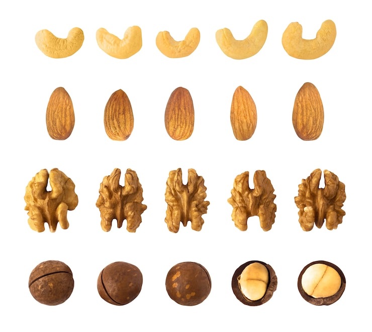 Photo set of cashew,almond, walnut and macadamia nuts isolated on white background