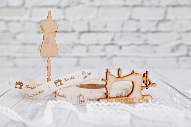 Sewing tape sewing machine and wood mannequin