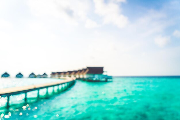 Sfocatura astratta spiaggia tropicale e mare delle Maldive per lo sfondo - Concetto di vacanza per le vacanze
